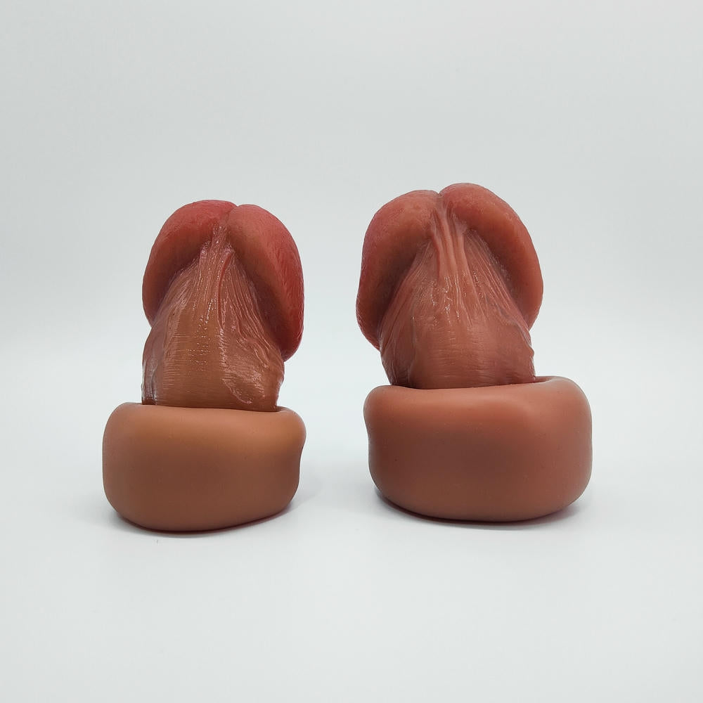 Rear view of the Classic penis sleeve in Small and Large sizes, showing inner canal and frenulum detail on a light background.