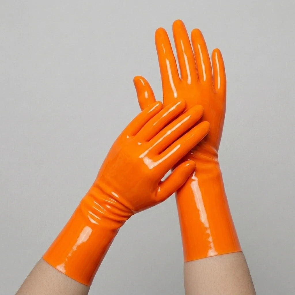 Orange short latex gloves, glossy seamless dipped latex, worn on both hands