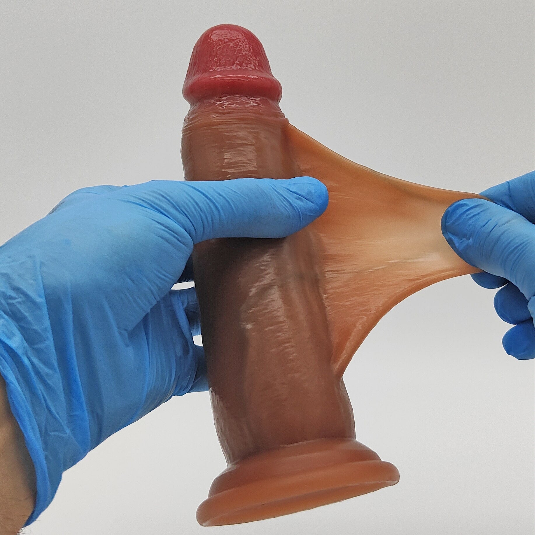 Sliding skin dildo