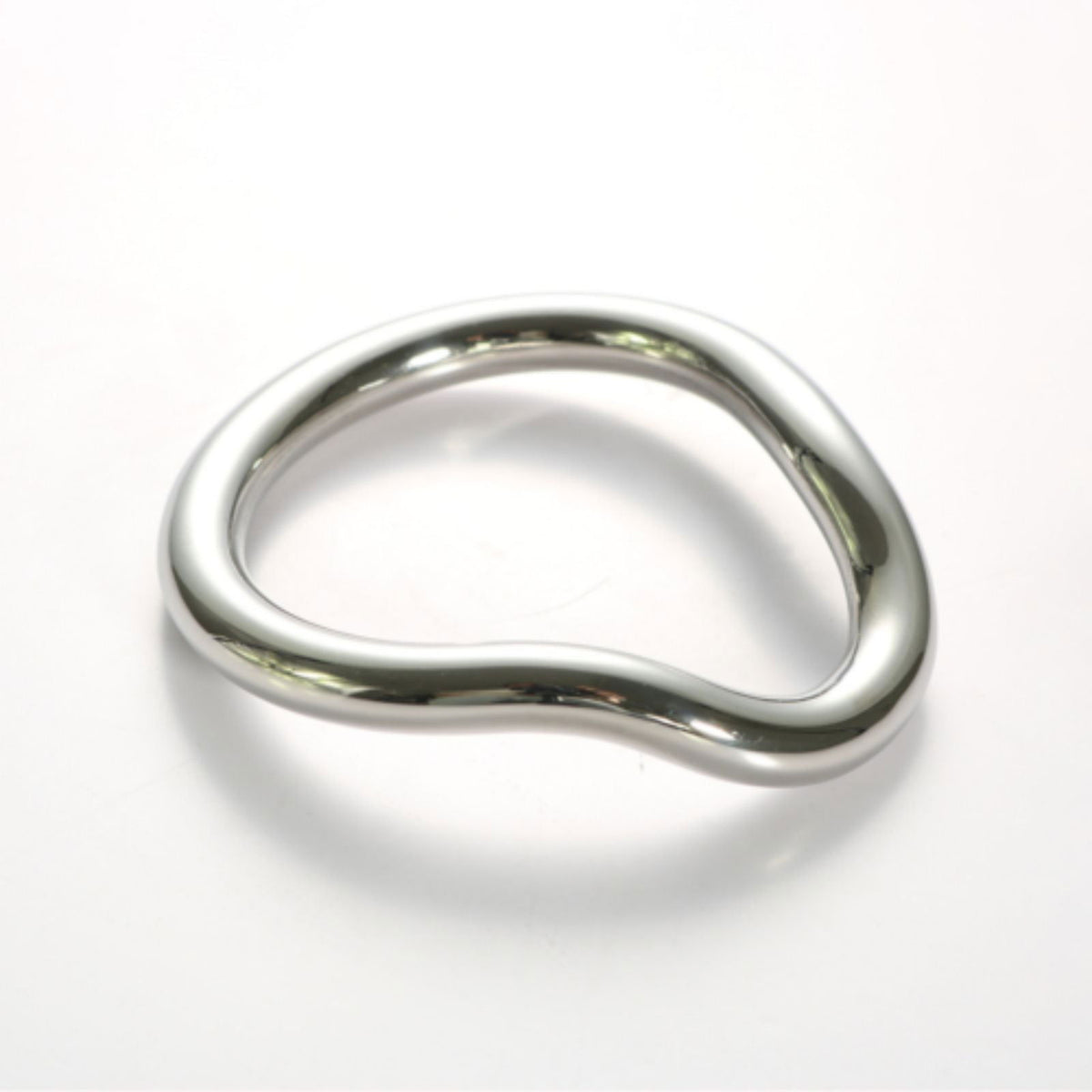 Stainless steel curved cock ring, front view of the polished contoured profile