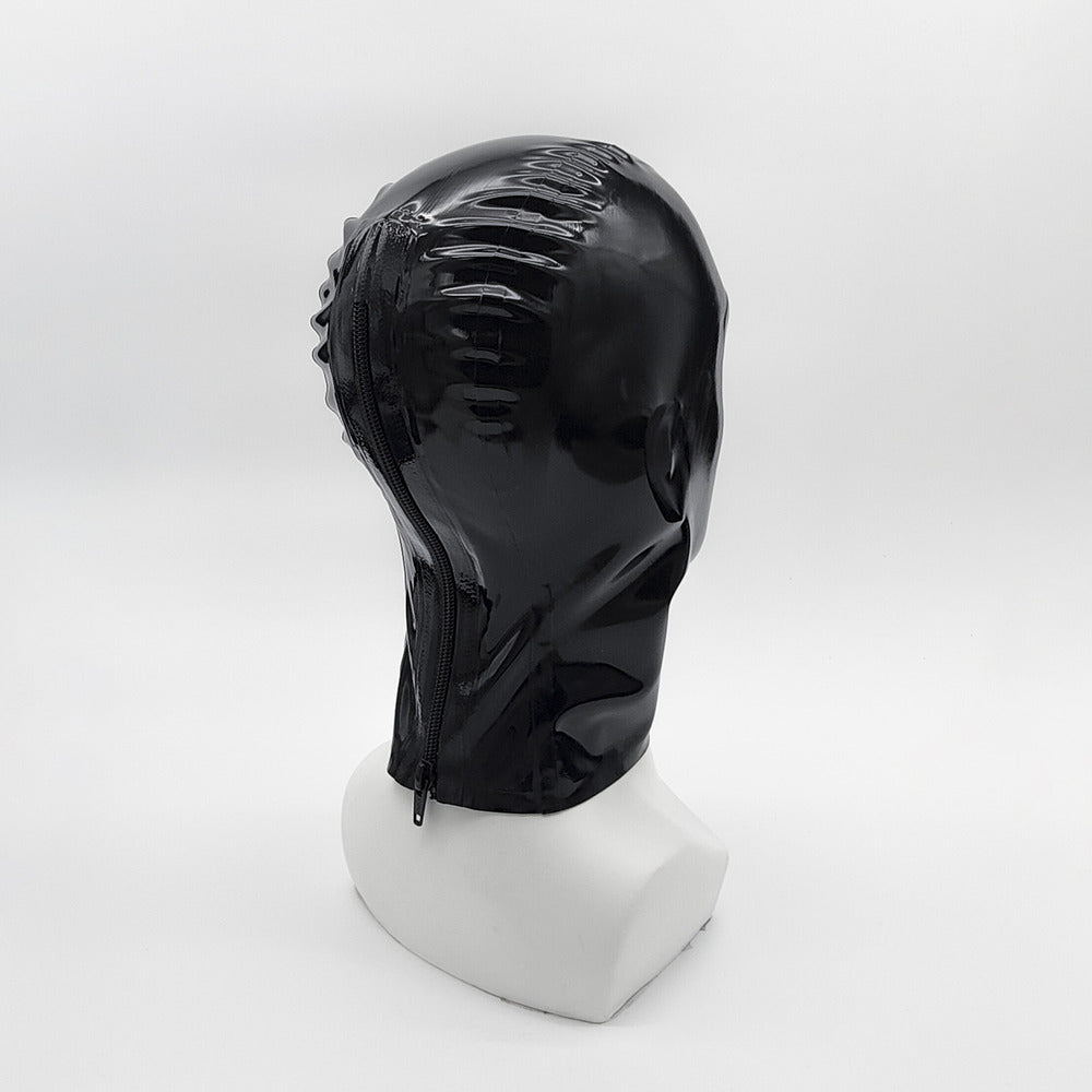 Black latex mask with a polished finish displayed on a white mannequin, back view.