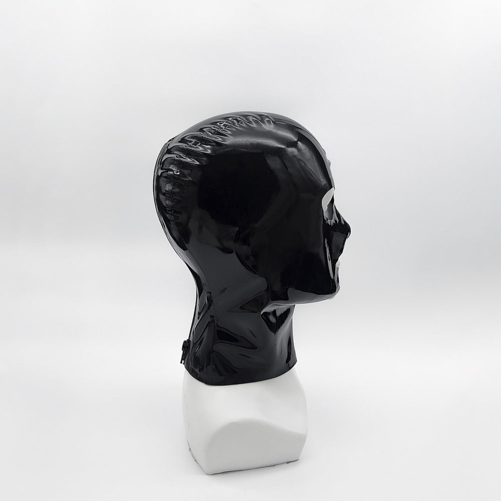 Black latex mask with a polished finish displayed on a white mannequin, right side view