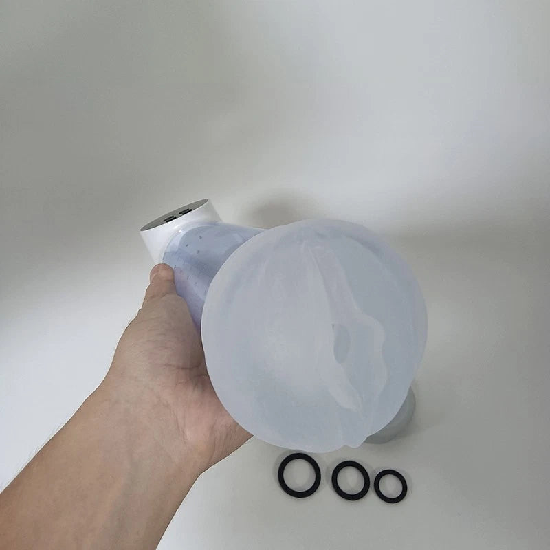 Bonus vagina-shaped silicone sleeve attachment for the electric pump's stimulation mode.