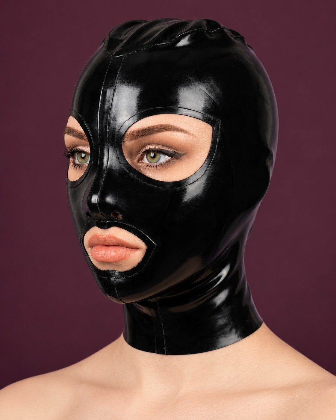 Woman wearing a black natural latex mask