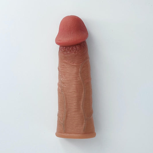 Angled front view of hyper realistic penis sleeve with mega veins, white background