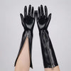 Detailed view of black latex gloves with one zipper fully closed and the other partially open.