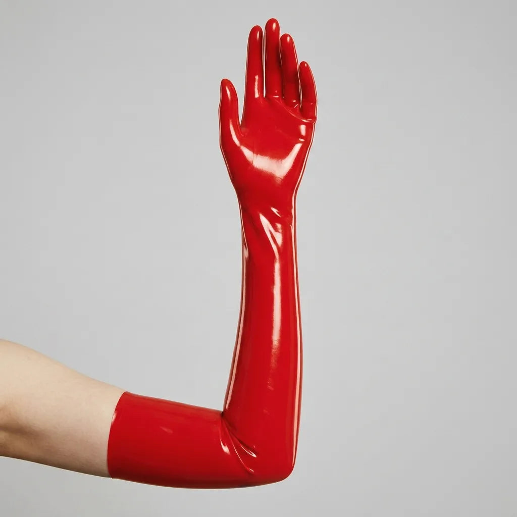 an arm showing opera latex glove in red coloration