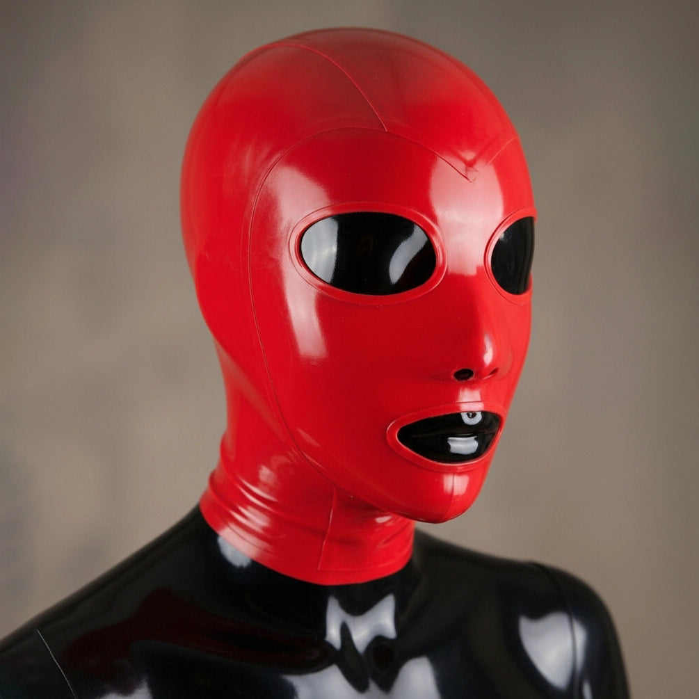 Side profile photograph of the red latex full face mask, highlighting the form-fitting nature of the latex and the contours of the facial openings