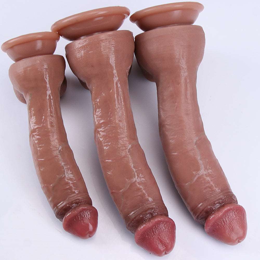 Sculpture Brown dildos in sizes S, M and L shown upside down to display their suction cup bases