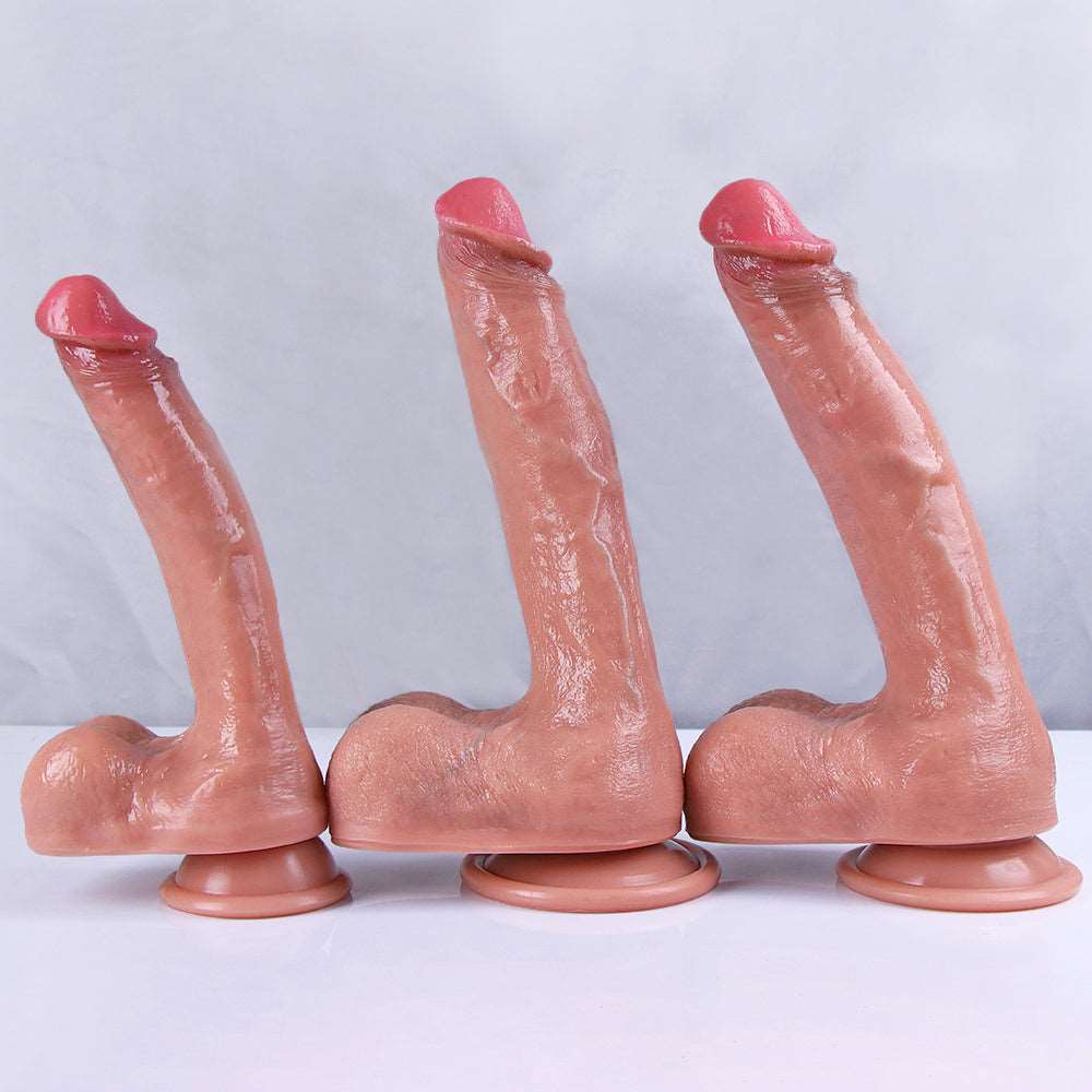 Sculpture White realistic dildo in sizes S, M and L standing side by side on their suction cup bases