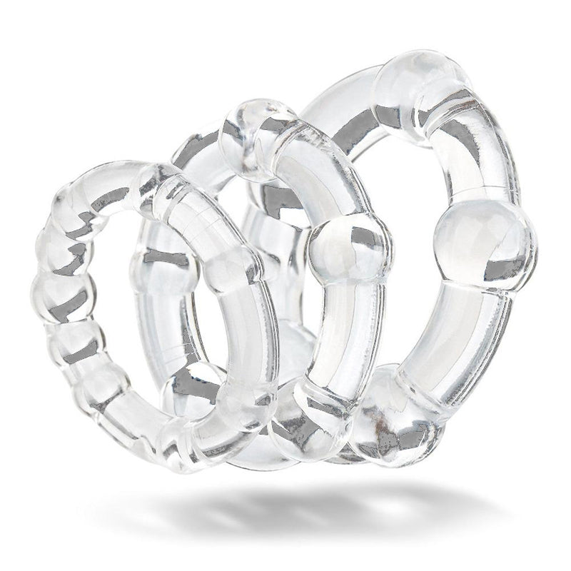 Transparent silicone cock rings stacked on top of each other